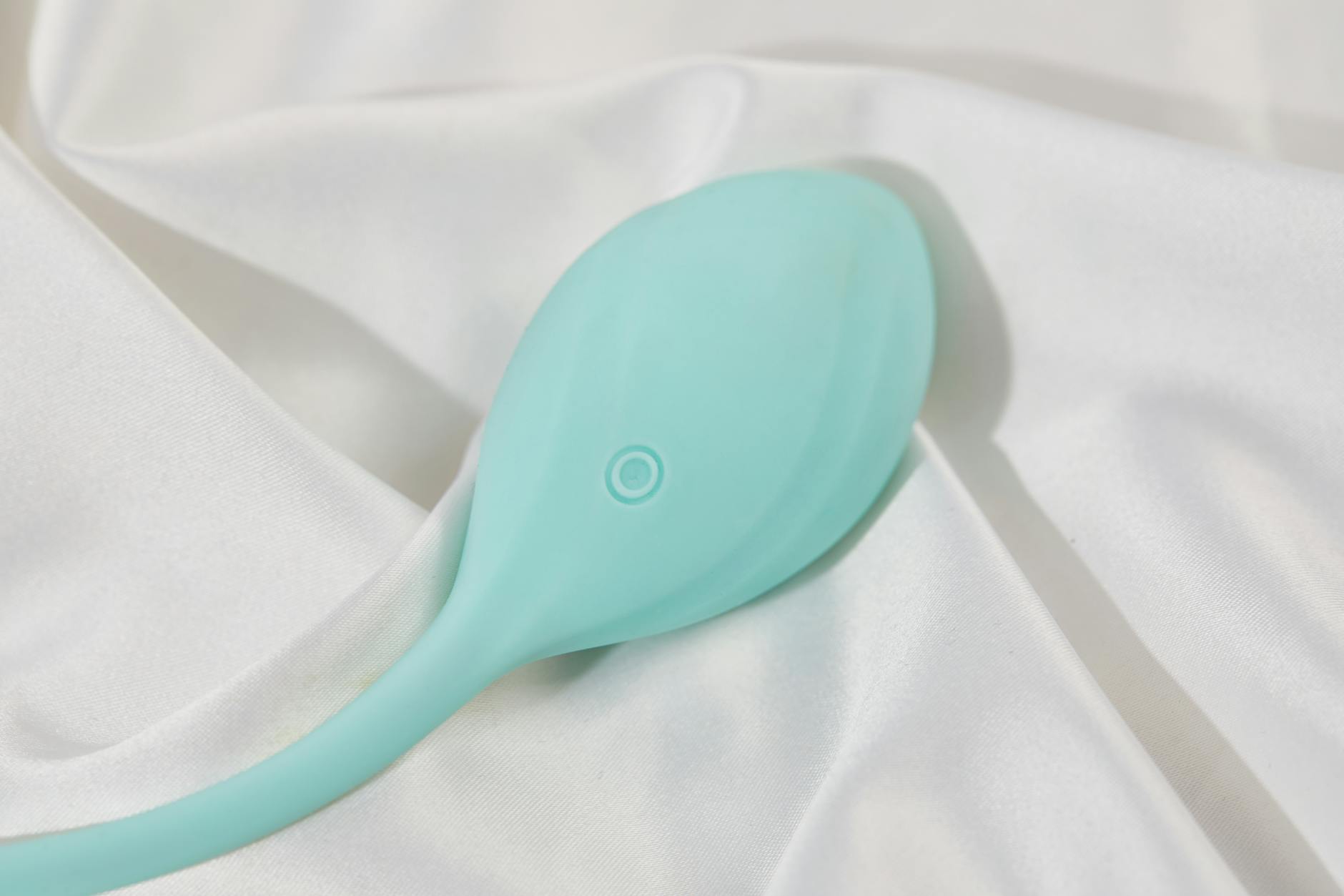 A couple holding a vibrator together, representing shared intimacy and modern pleasure