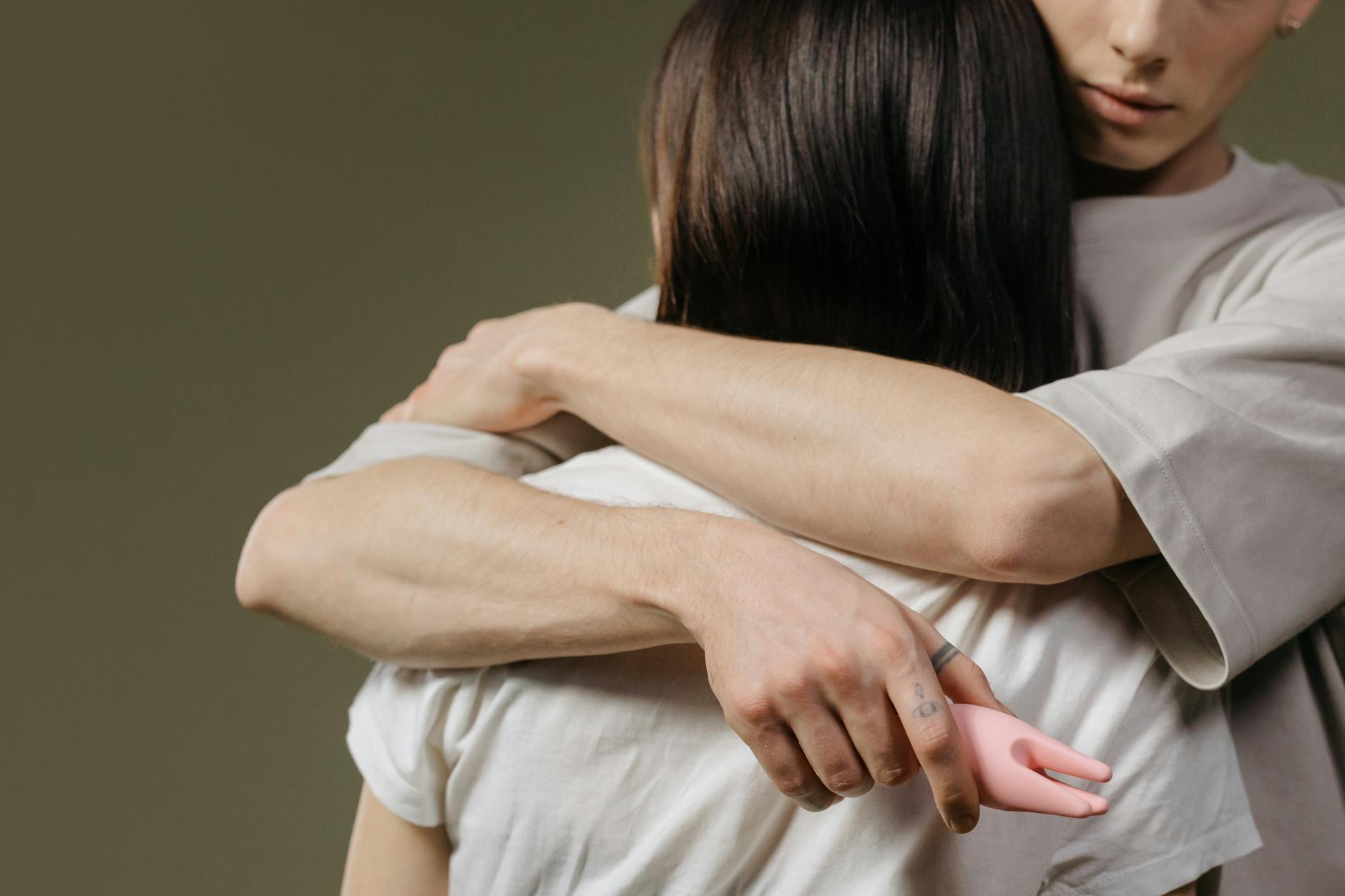 Close-up of a couple embracing, highlighting intimacy and connection during hormonal changes